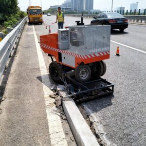 Image 1 of compact concrete curbing machine