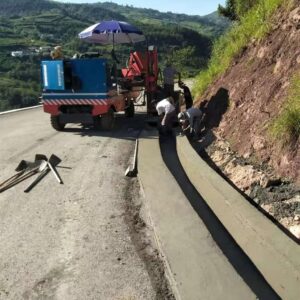 Image 1 of concrete curb slipform paver review